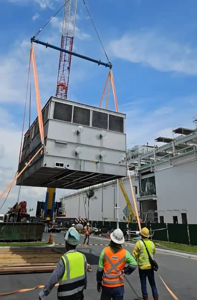 Engineers providing on-site field support for a critical crane lifting operation.