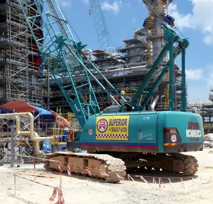 A 55-ton crawler crane from our rental fleet working inside a petrochemical refinery.