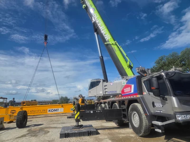 A 300-ton Zoomlion mobile crane lifting components of an RTG crane at a Precast Factory in Johor Bahru.