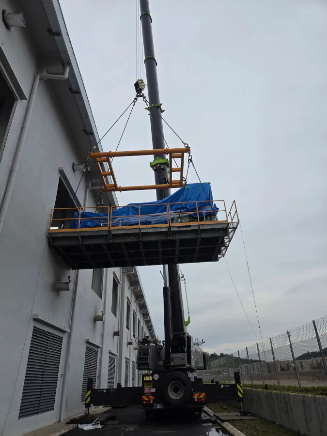 The 300 Ton Mobile Crane Rental precisely hoisting the generator in Kulai, Johor Bahru.